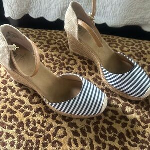 Size 9 Espadrille shoes.Slightly worn Stripped  navy and white stripes on toe.